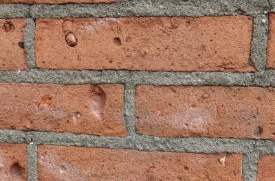 Schade baksteen metstelwerk